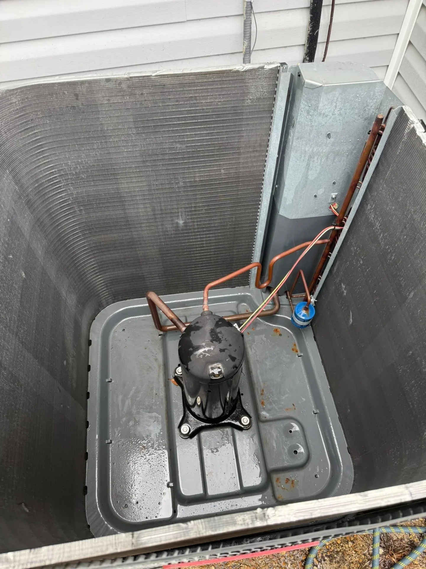 Internal compressor and condenser unit during HVAC repair