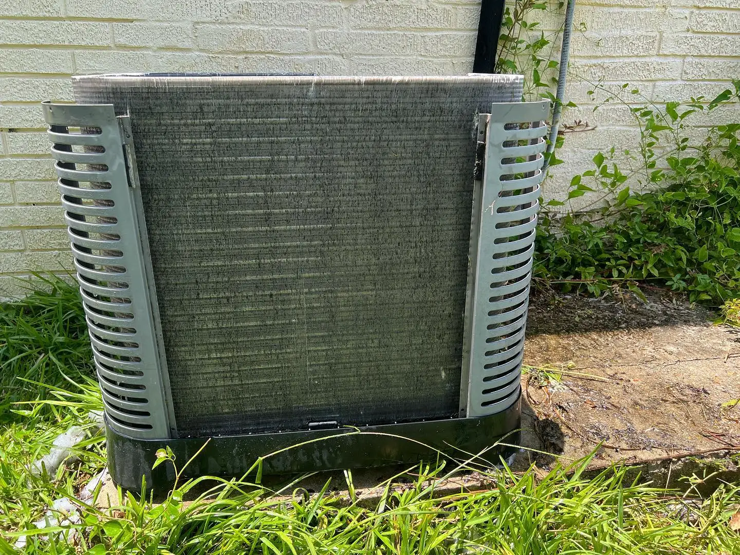 Dirty AC condenser unit needing repair in Kentwood, LA