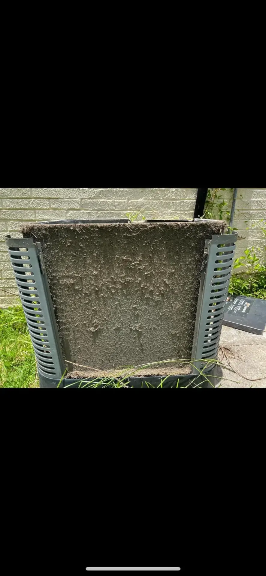 Dirty outdoor AC unit needing professional repair in Kentwood, LA