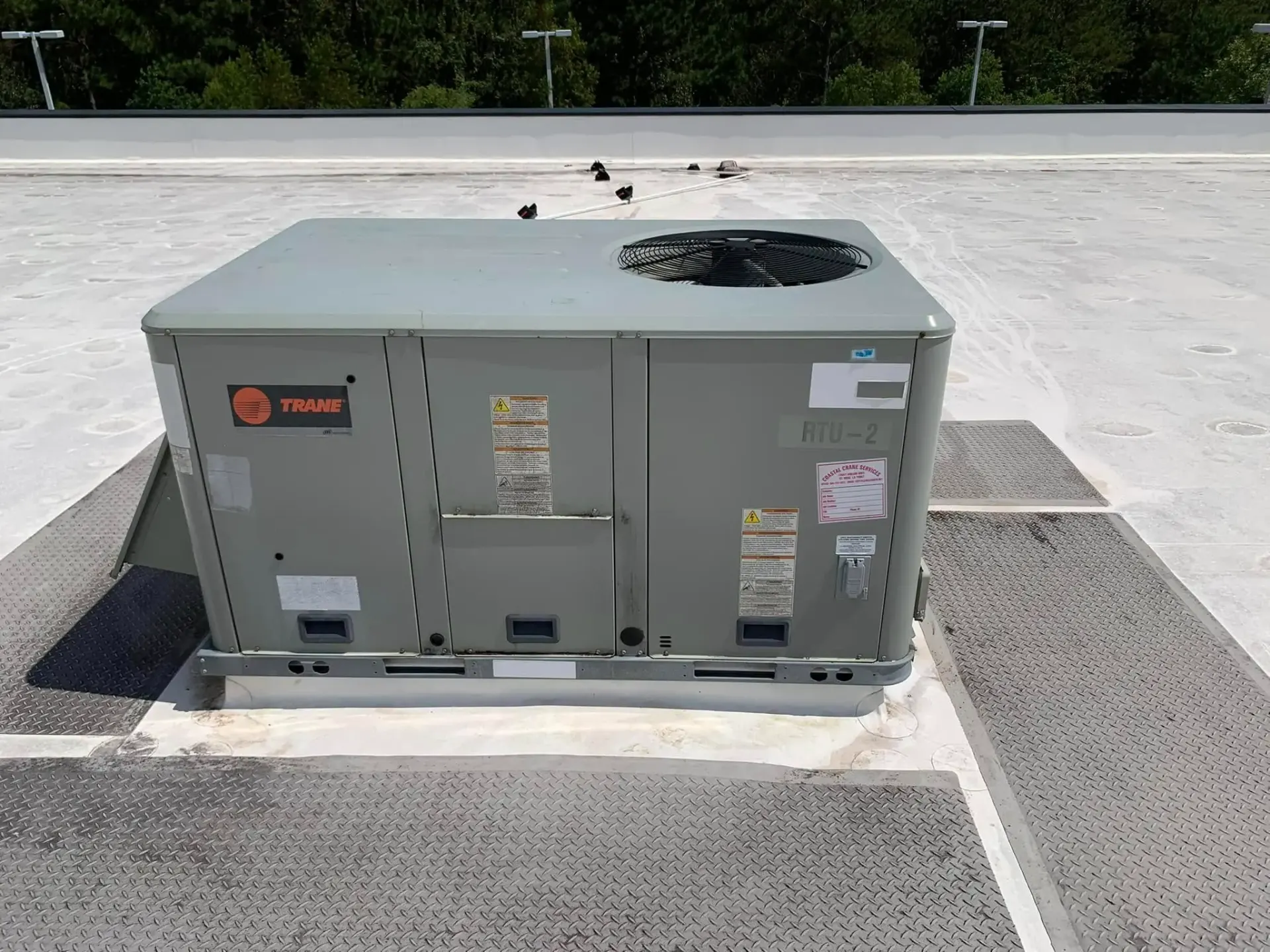 Trane commercial rooftop unit during scheduled maintenance